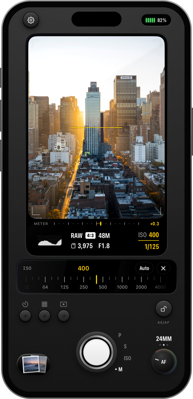 Sensor’s ISO dial over a city at sunset